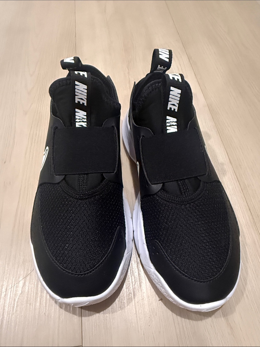 Nike Kids Black and White Slip-On Athletic Sneakers